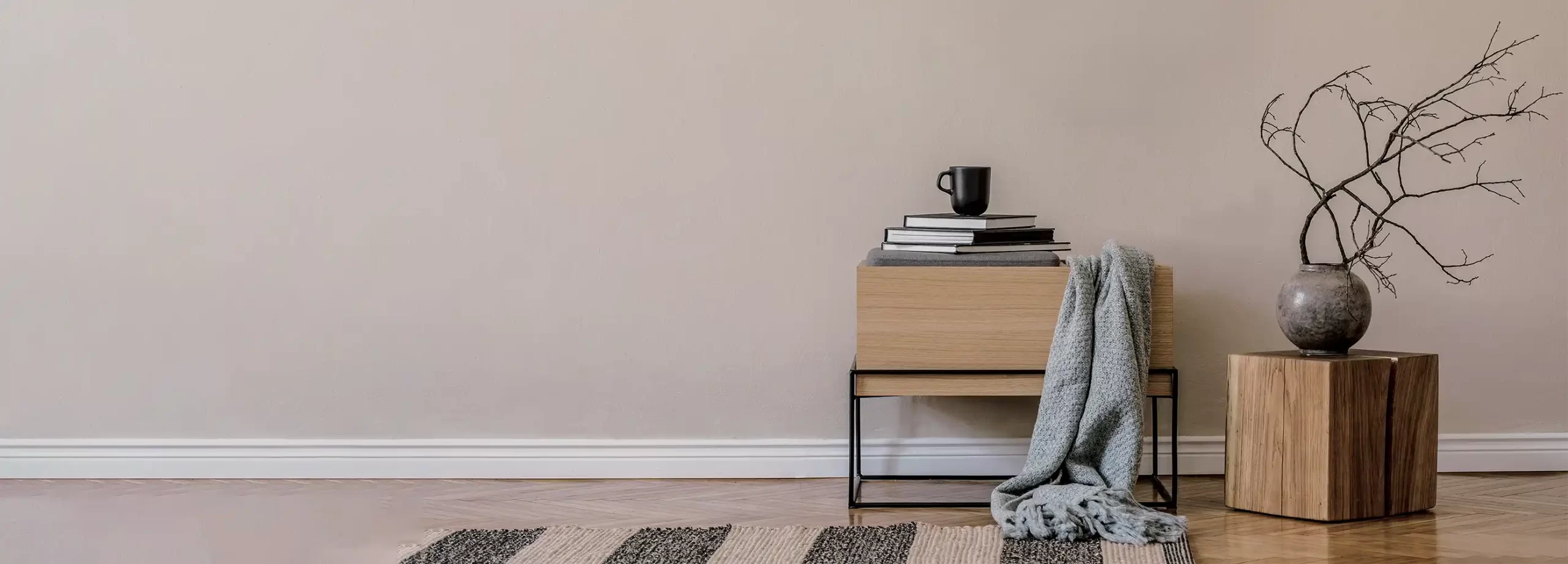 Brownish beige interior wall with side table