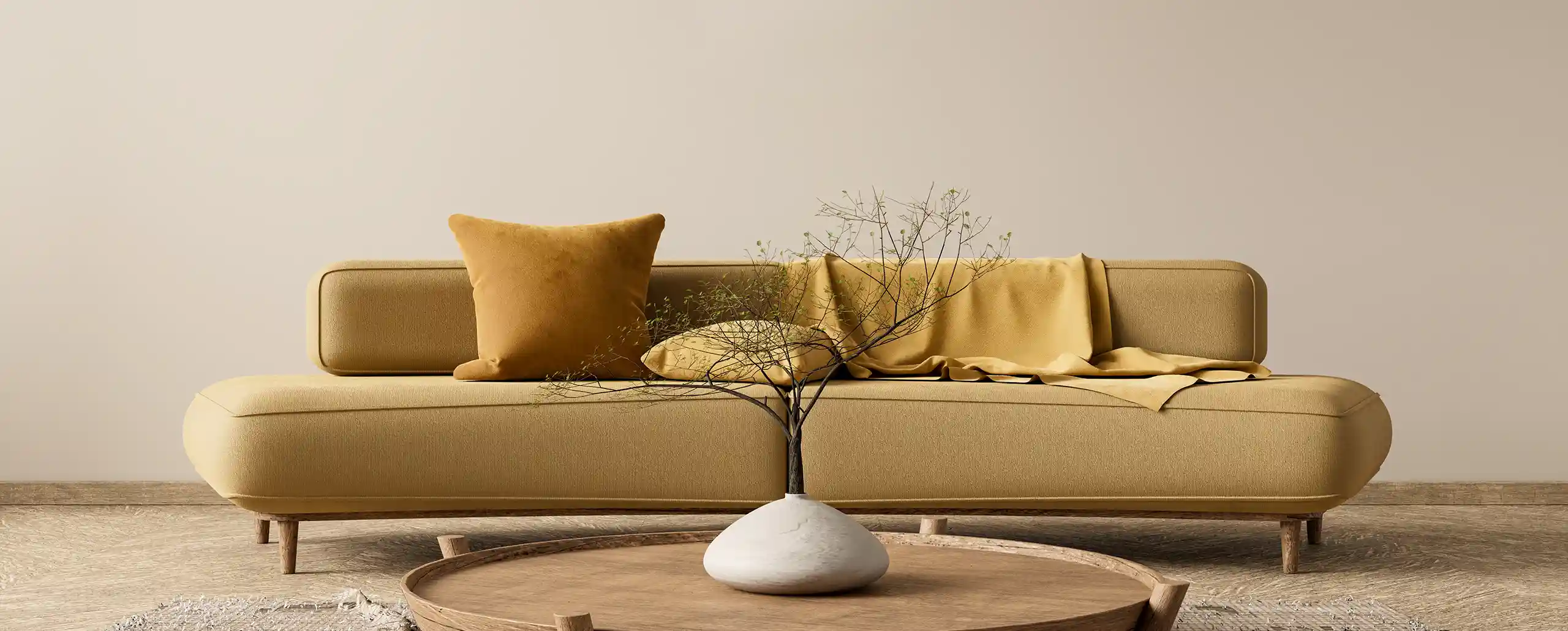 Japandi-styled room with white walls, a yellow sofa, and a table