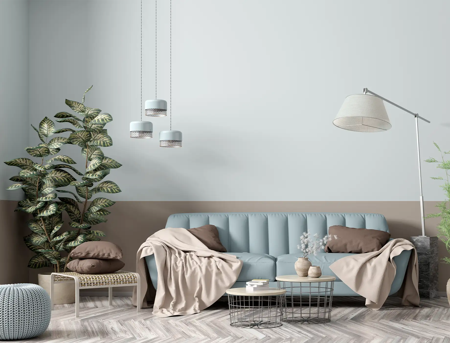 Modern living room featuring a light blue sofa adorned with cozy blankets and pillows, complemented by stylish pendant lights and lush greenery. The walls are painted in soothing tones using Nippon Paint products, creating a serene atmosphere. A wooden coffee table with decorative vases adds a touch of elegance to the space.