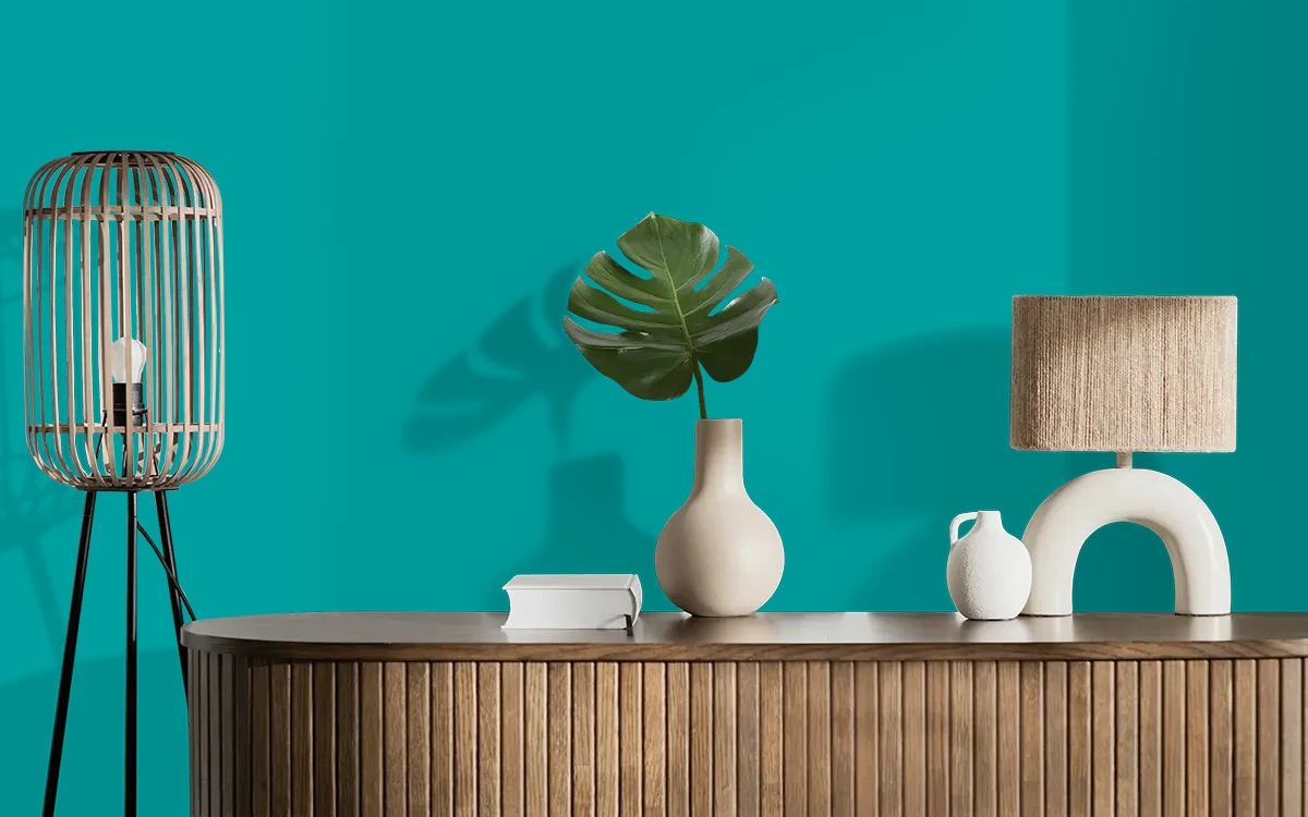 Nippon Paint's AEGEAN SEA color on different wall surfaces.