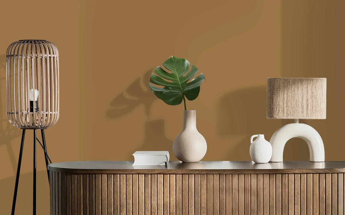 Nippon Paint's AGED WHISKY color on different wall surfaces.