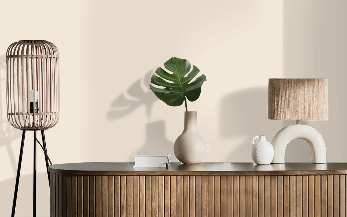 Nippon Paint's ALMOND BITS color on different wall surfaces.