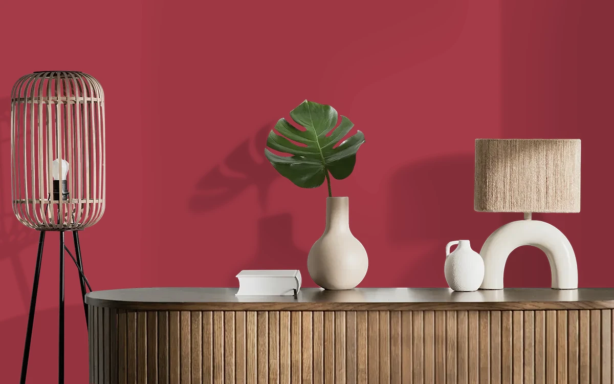 Nippon Paint's ALPHA RED color on different wall surfaces.