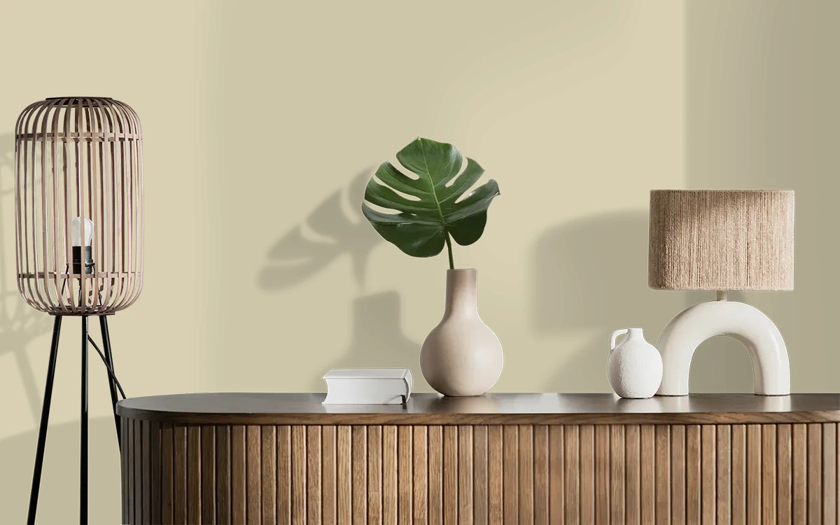 Nippon Paint's AMBER GLEAM color on different wall surfaces.