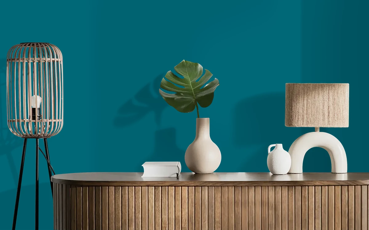 Nippon Paint's ARABIAN GULF color on different wall surfaces.
