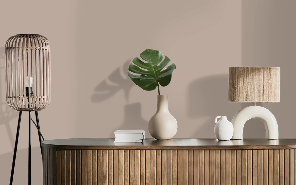 Nippon Paint's AUBURN BLAZE color on different wall surfaces.