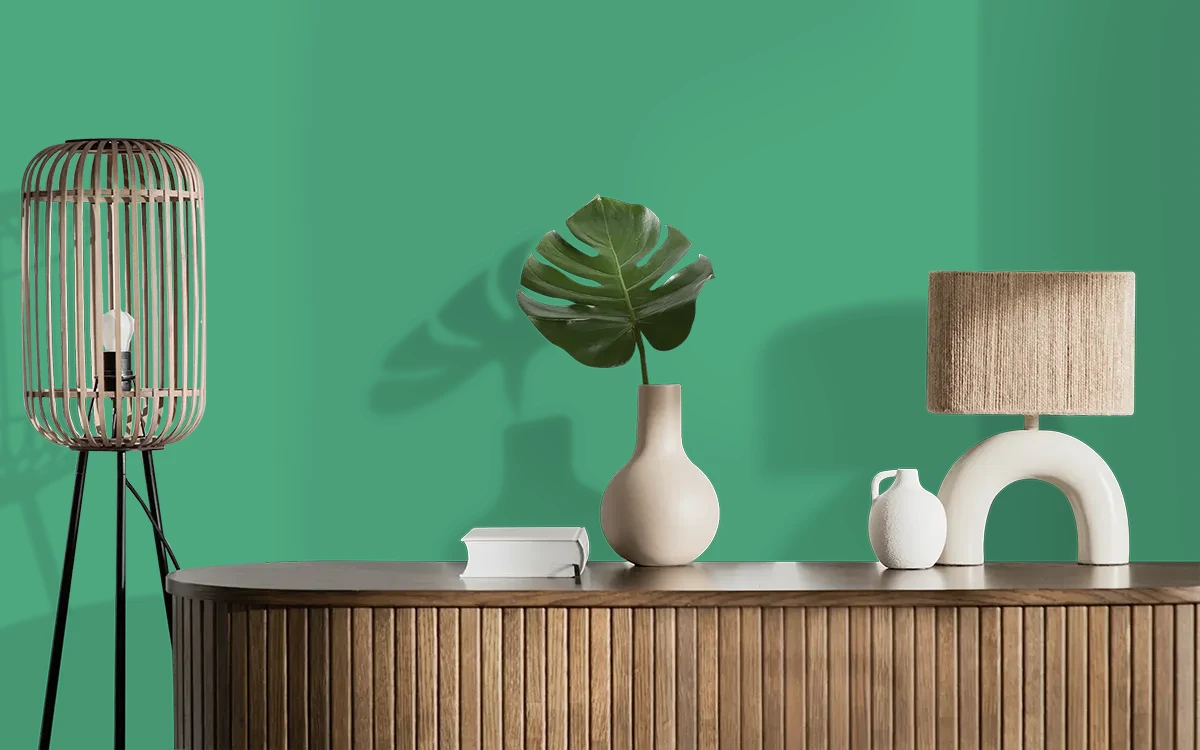 Nippon Paint's BASIL SWIRL color on different wall surfaces.