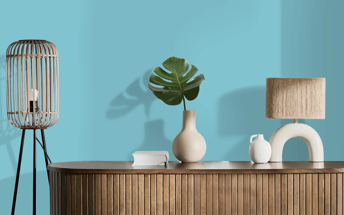 Nippon Paint's BEACH LAGOON color on different wall surfaces.