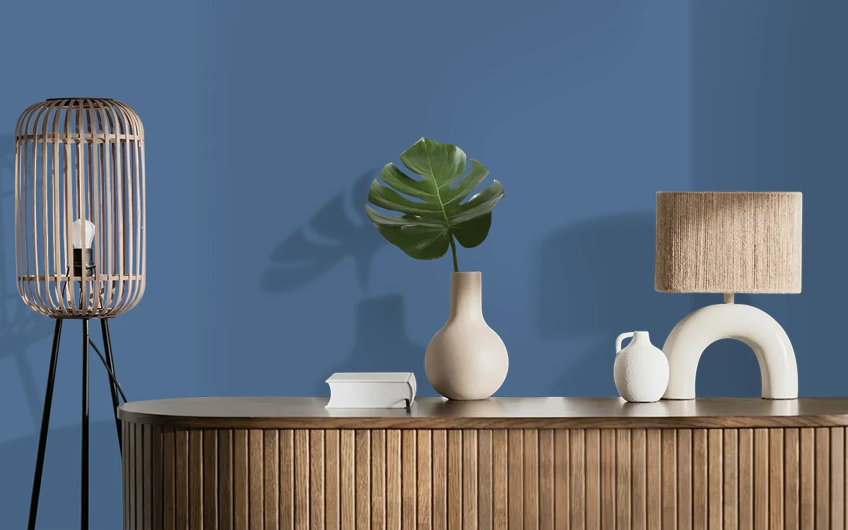 Nippon Paint's BLUE BRACELET color on different wall surfaces.