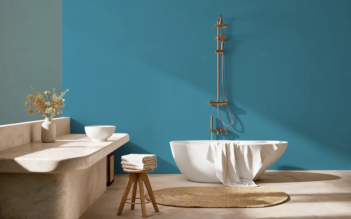 Nippon Paint's BLUE JUNIPER color on different wall surfaces.