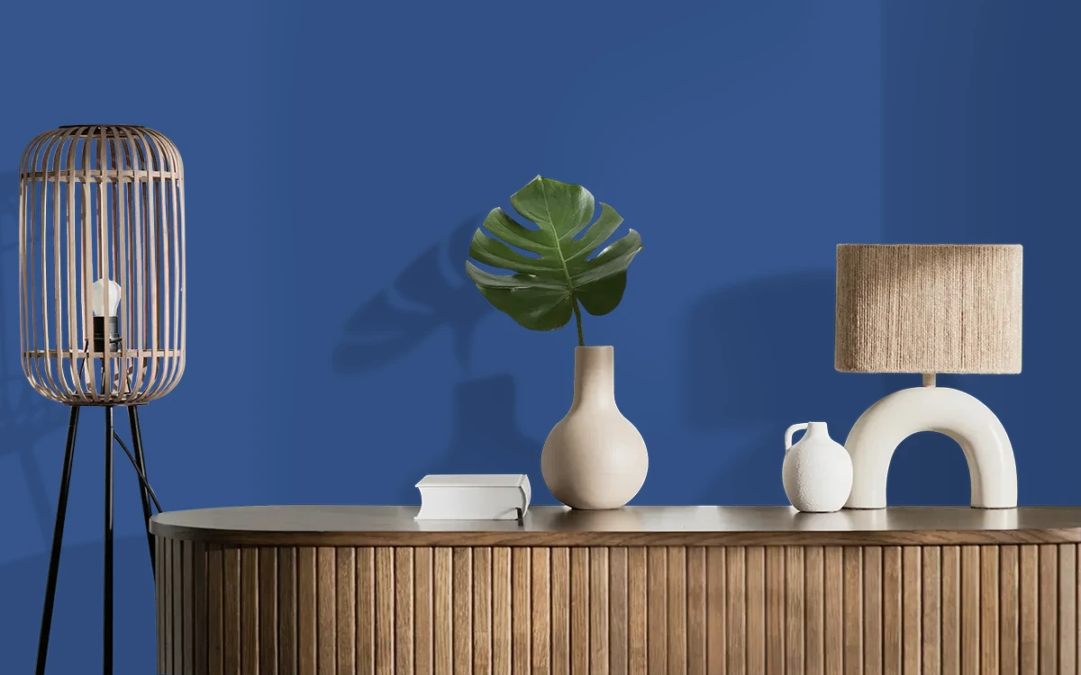 Nippon Paint's BLUE MERCURY color on different wall surfaces.