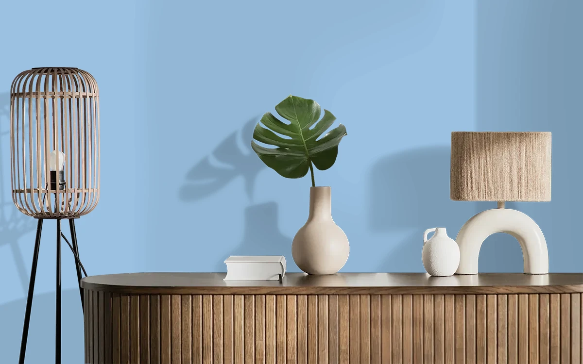 Nippon Paint's BLUE RHYTHM color on different wall surfaces.
