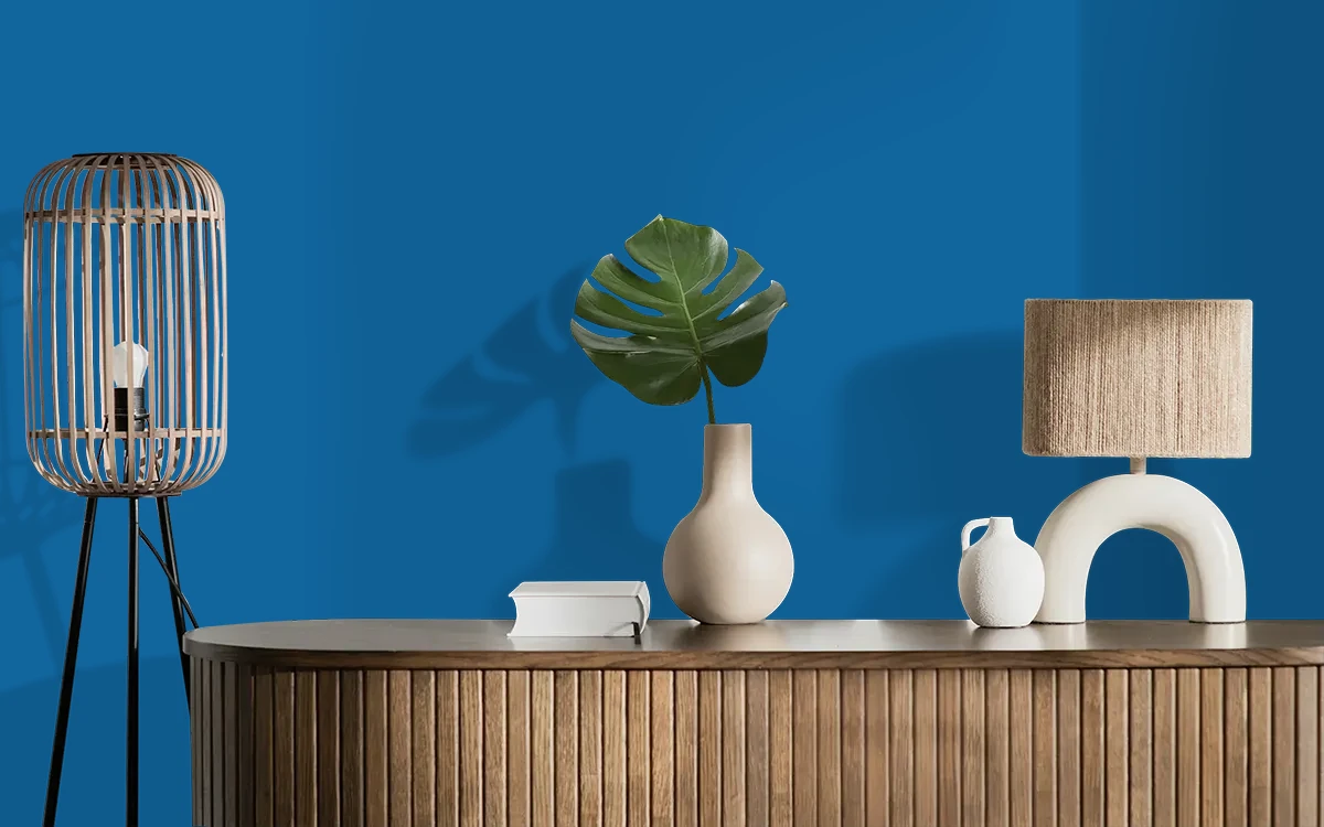 Nippon Paint's BLUE SAPPHIRE color on different wall surfaces.