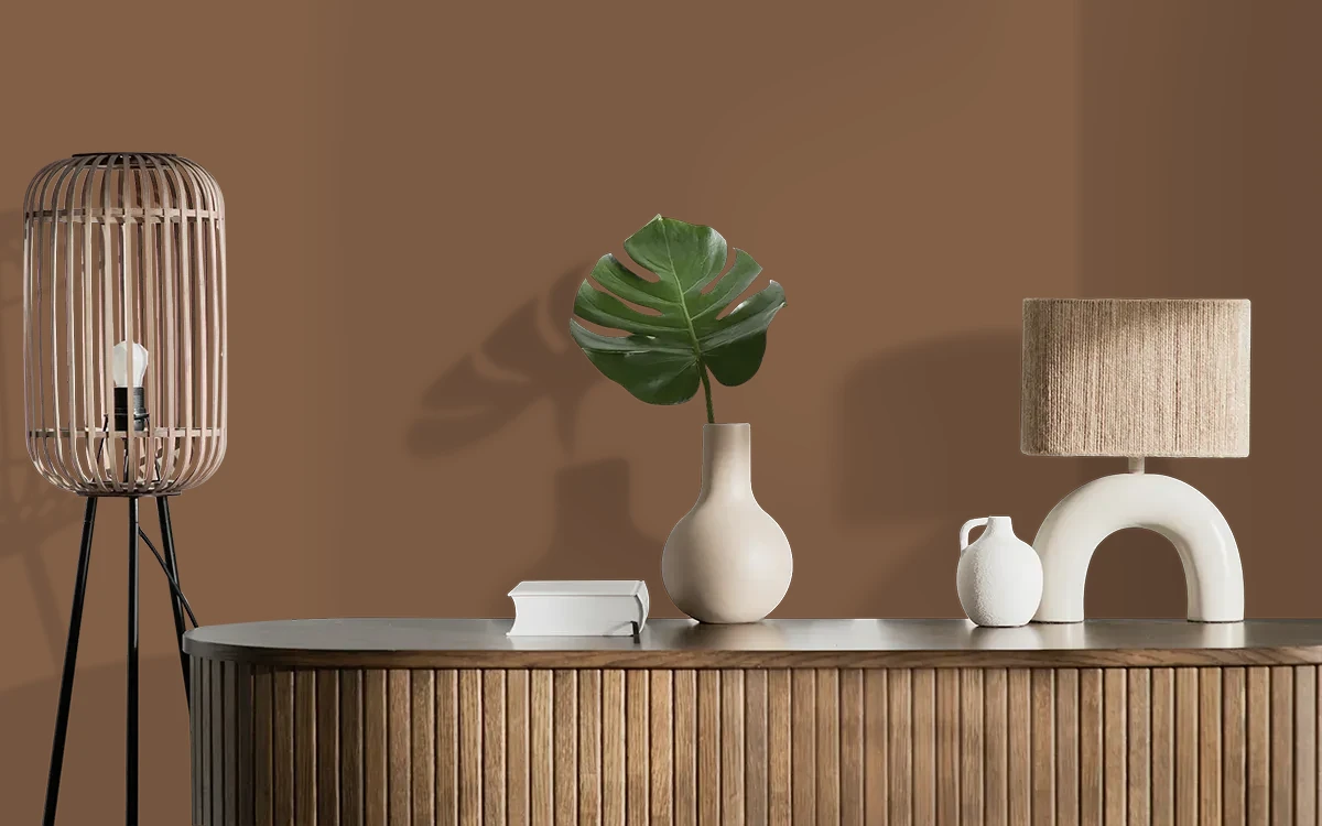 Nippon Paint's BOTTLE TREE color on different wall surfaces.