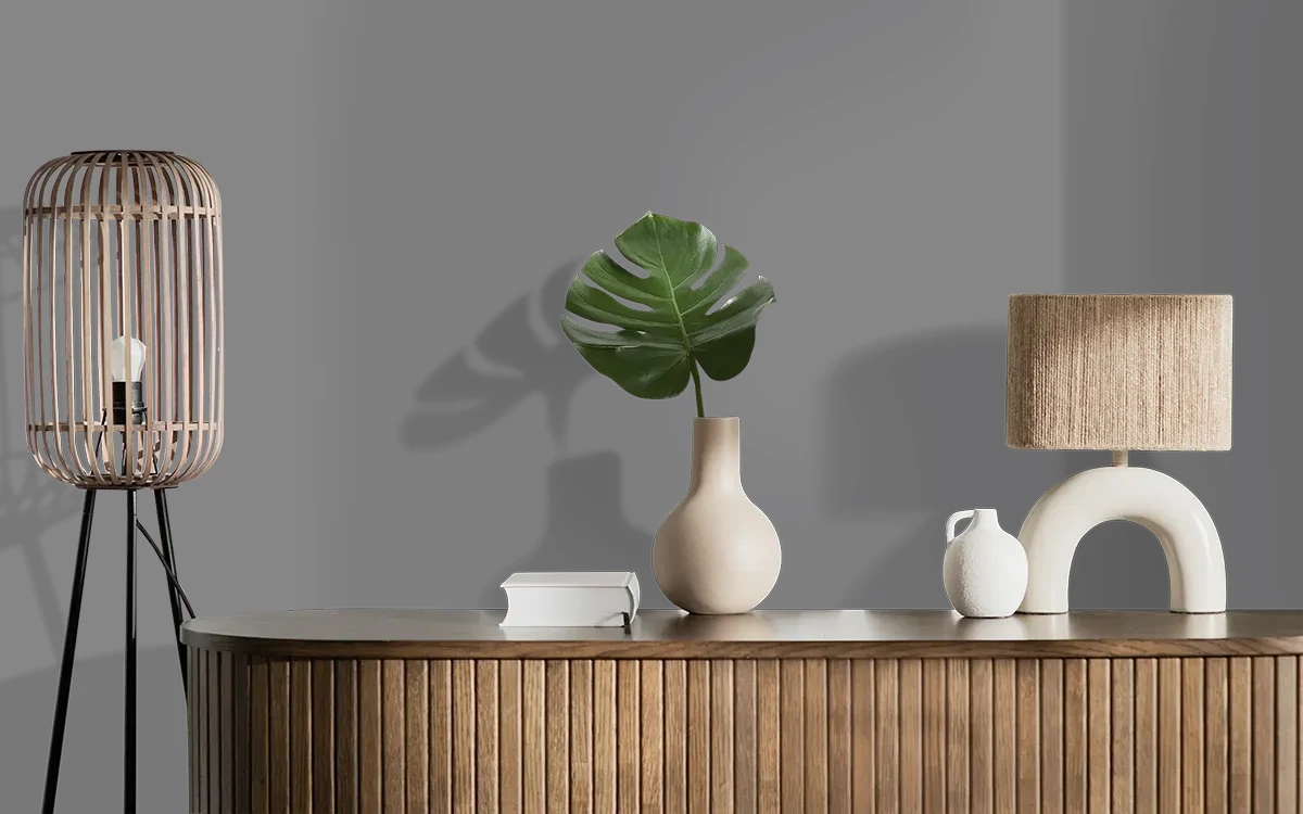 Nippon Paint's BROODING GRAY color on different wall surfaces.