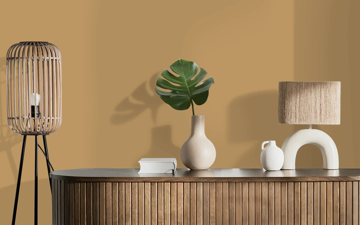 Nippon Paint's BROWNED GARLIC color on different wall surfaces.