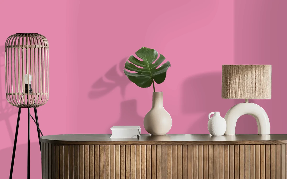 Nippon Paint's BUBBLEGUM PINK color on different wall surfaces.