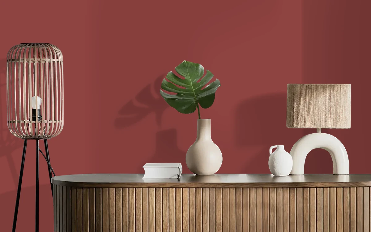 Nippon Paint's BURGUNDY color on different wall surfaces.