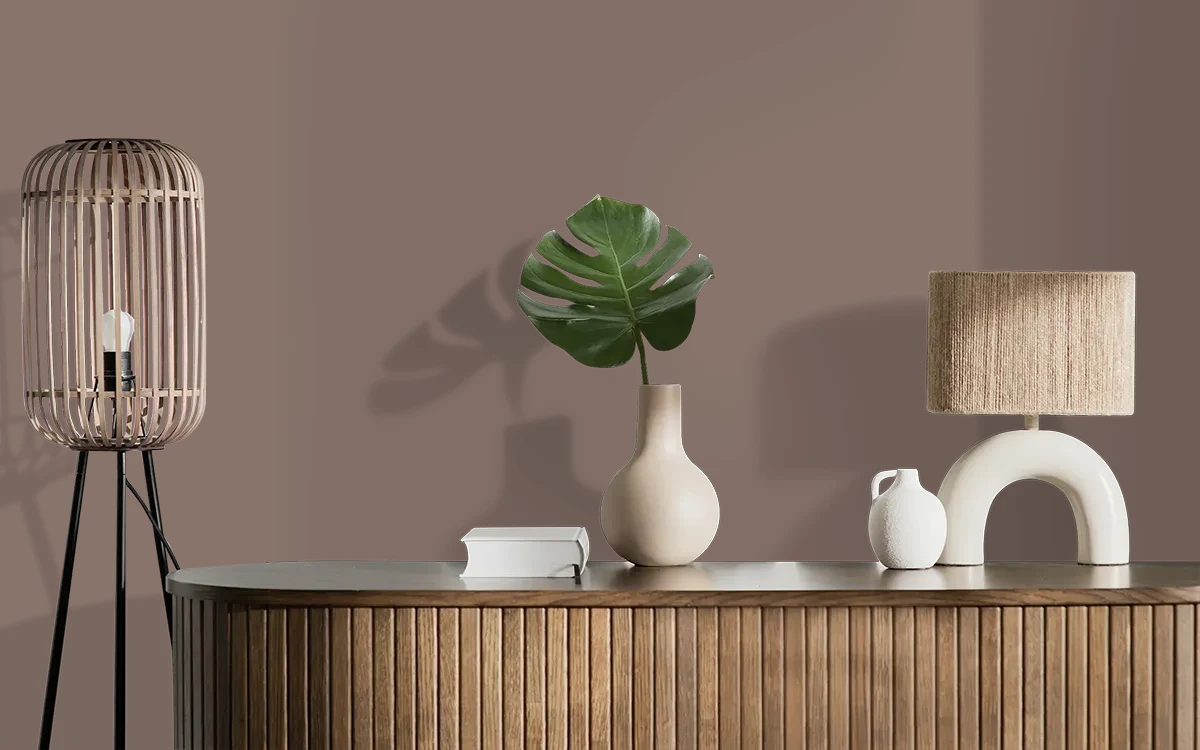 Nippon Paint's BURGUNDY BURST color on different wall surfaces.