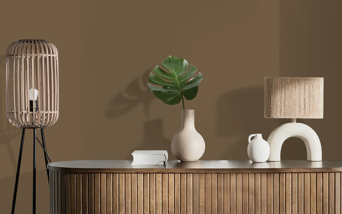 Nippon Paint's BURNT PATCH color on different wall surfaces.