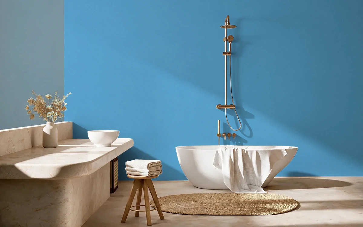 Nippon Paint's BUSTLING BLUE color on different wall surfaces.