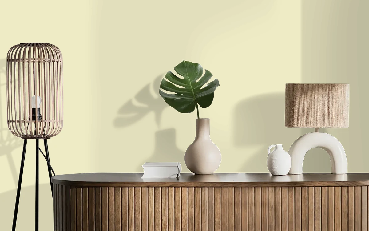 Nippon Paint's BUTTERCUP color on different wall surfaces.