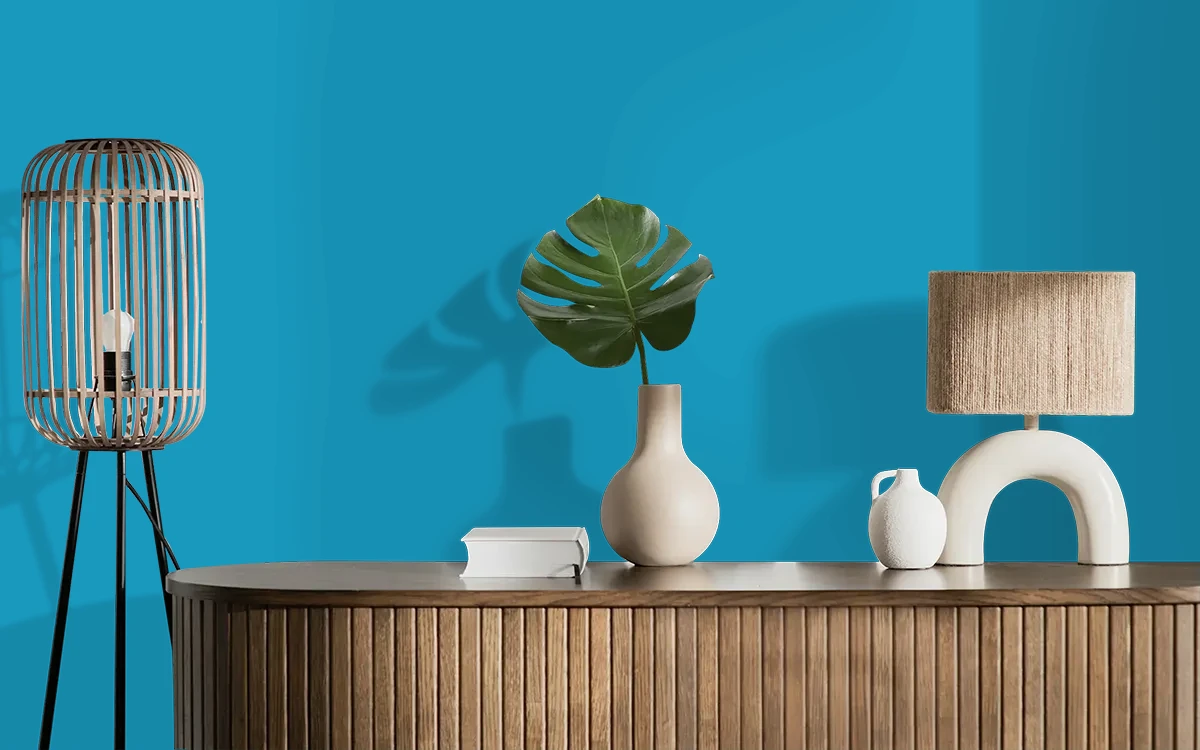 Nippon Paint's CALM OCEAN color on different wall surfaces.