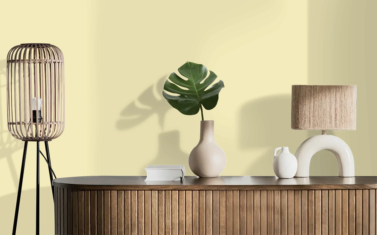 Nippon Paint's CANDLELIGHT color on different wall surfaces.