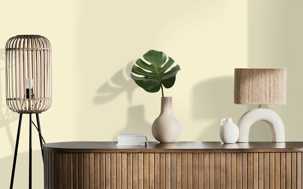 Nippon Paint's CANDLESTICK color on different wall surfaces.