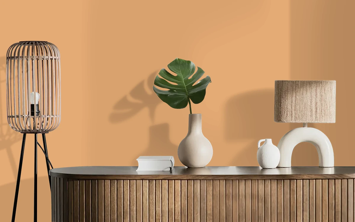 Nippon Paint's CARAMEL SUGAR color on different wall surfaces.