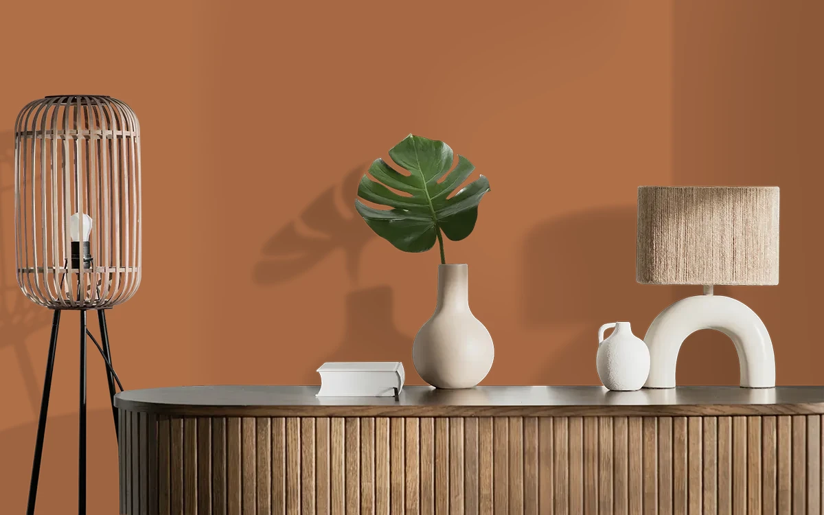 Nippon Paint's CARAMEL TWIRL color on different wall surfaces.