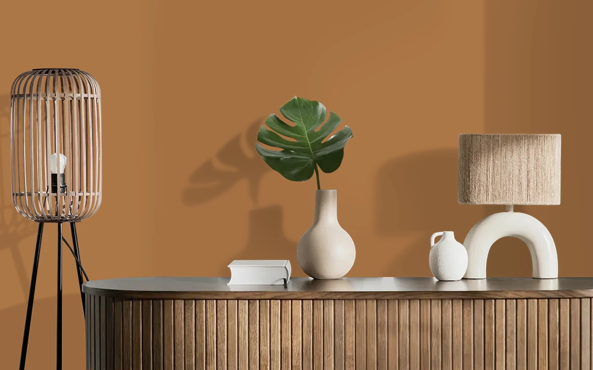 Nippon Paint's CARAMEL TWIST color on different wall surfaces.
