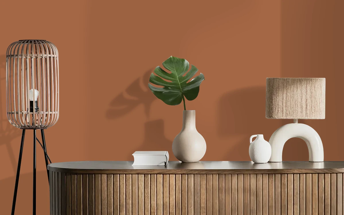 Nippon Paint's CARAMELISED DIP color on different wall surfaces.