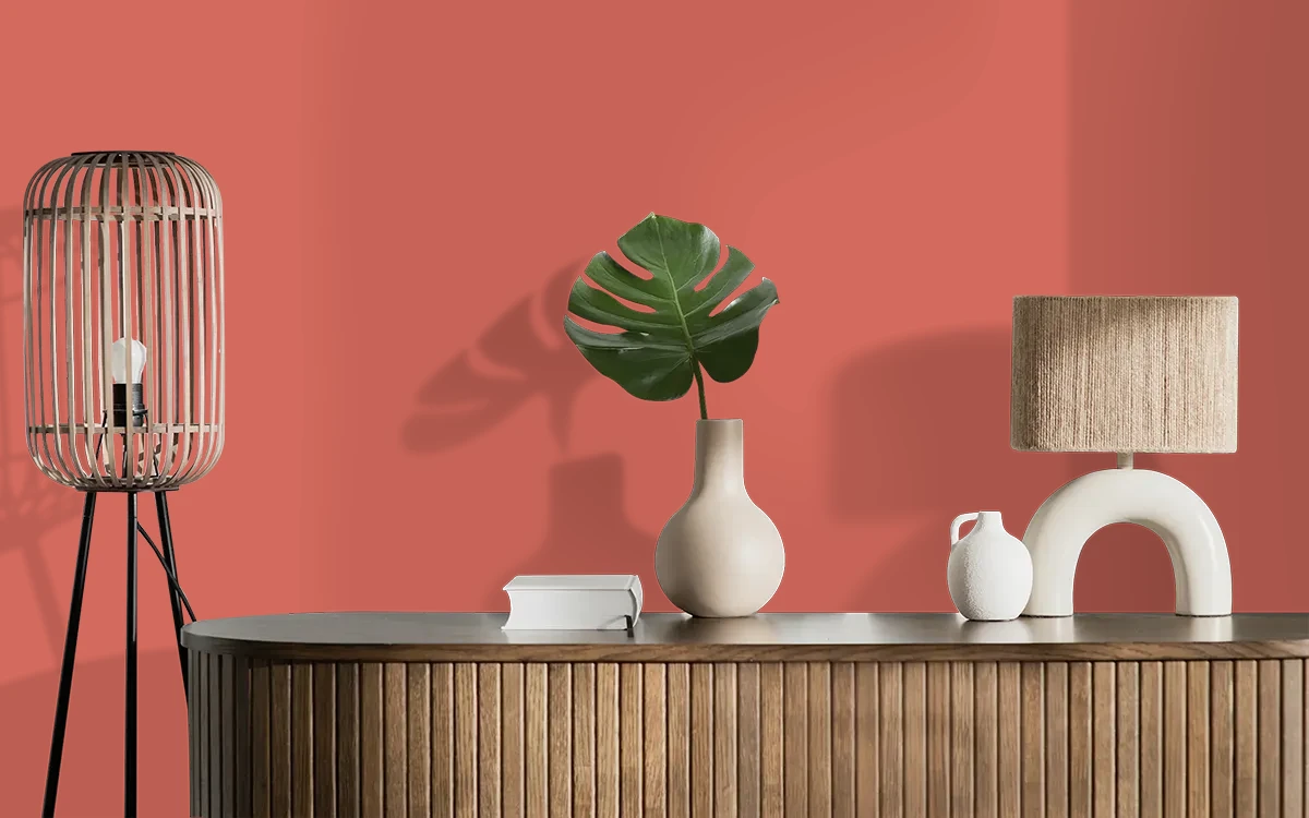 Nippon Paint's CARDINAL CARNAGE color on different wall surfaces.
