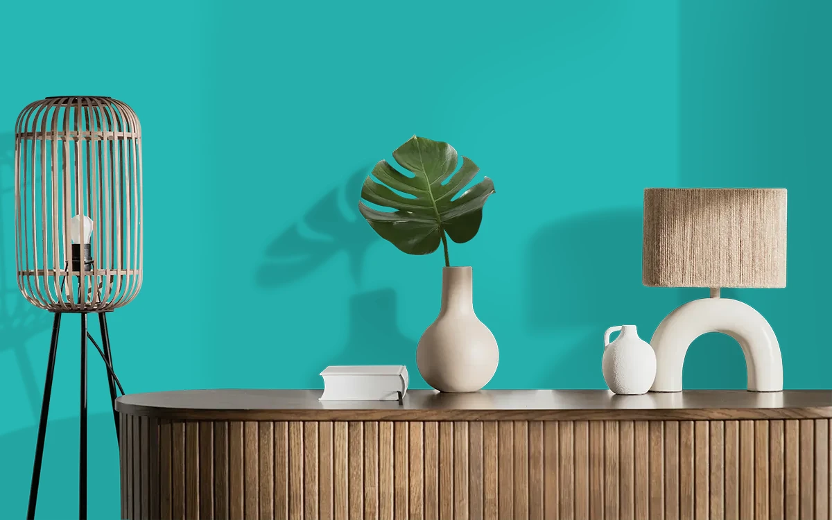 Nippon Paint's CARRIBEAN SEA color on different wall surfaces.