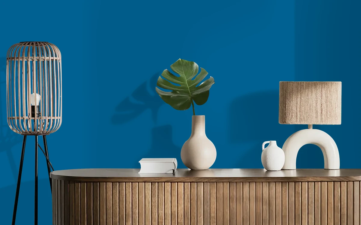 Nippon Paint's CIRCUIT BLUE color on different wall surfaces.