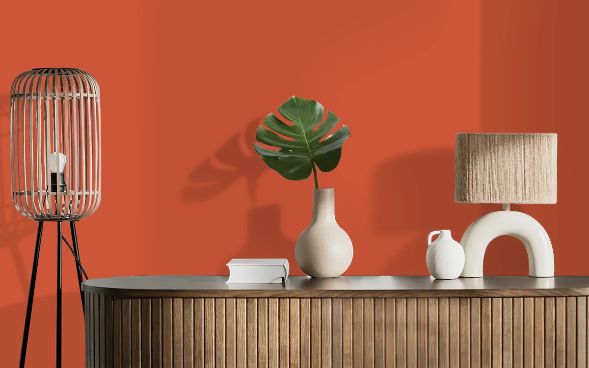 Nippon Paint's CLEMENTINE color on different wall surfaces.