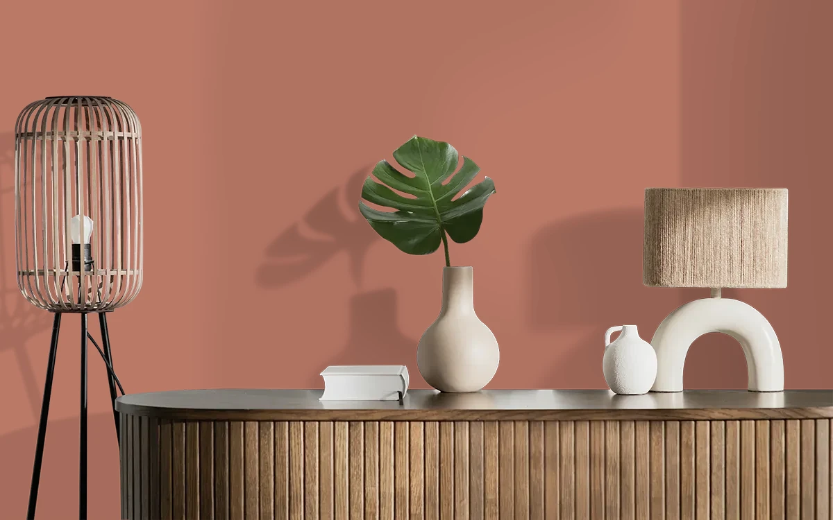 Nippon Paint's CLEMENTINE HAZE color on different wall surfaces.