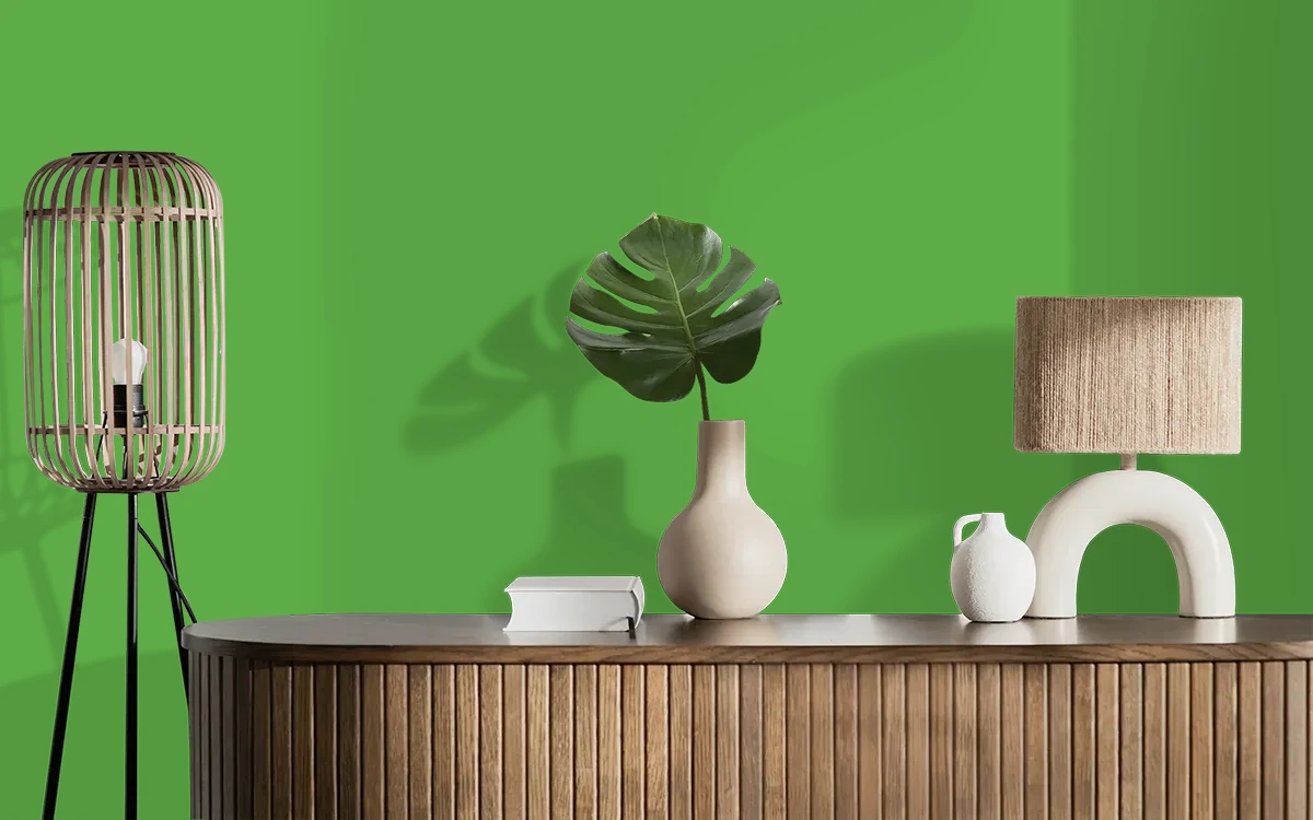 Nippon Paint's COLLEEN GREEN color on different wall surfaces.