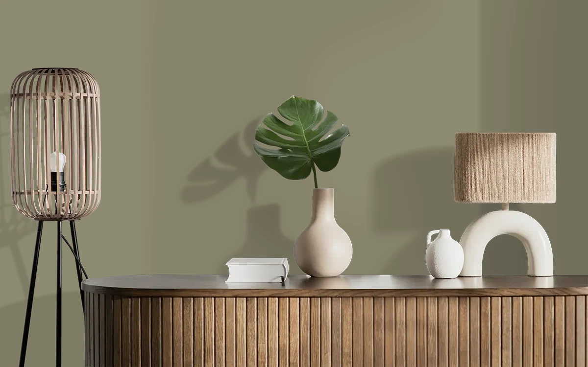 Nippon Paint's CONCRETE KERB color on different wall surfaces.