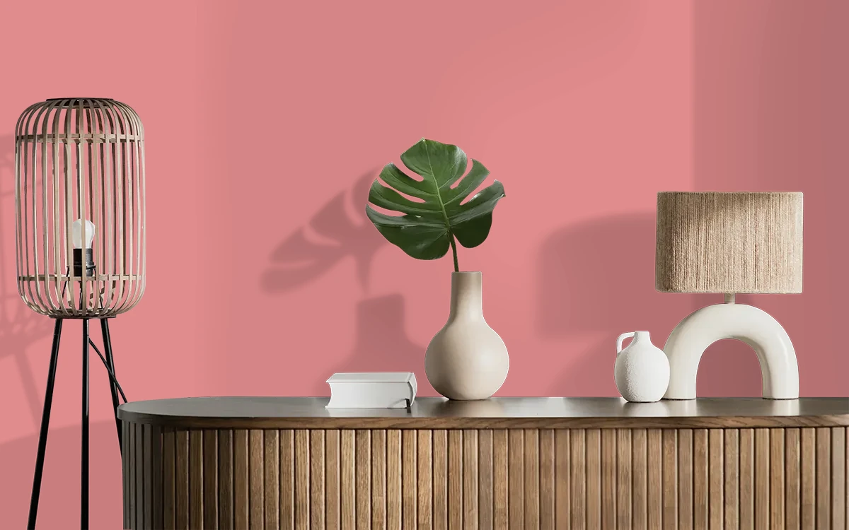 Nippon Paint's CORAL PIN color on different wall surfaces.