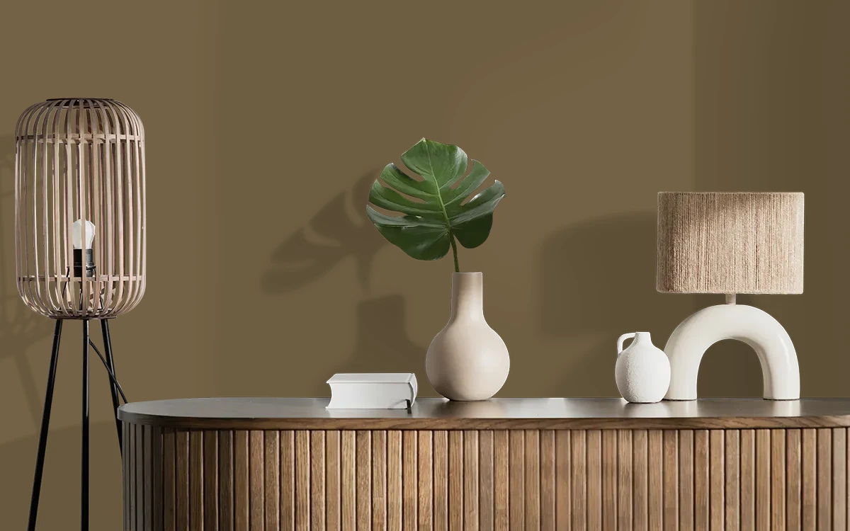 Nippon Paint's CREAMY CARAMEL color on different wall surfaces.