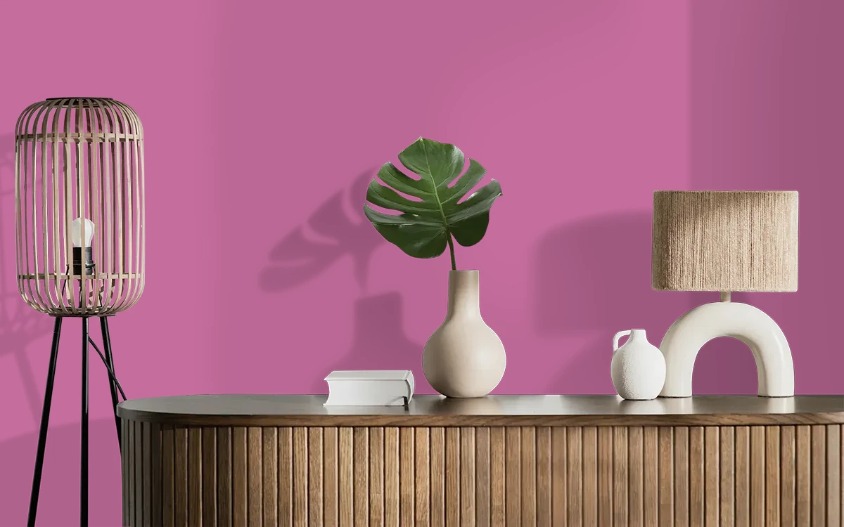 Nippon Paint's CRIMSON TIDE color on different wall surfaces.