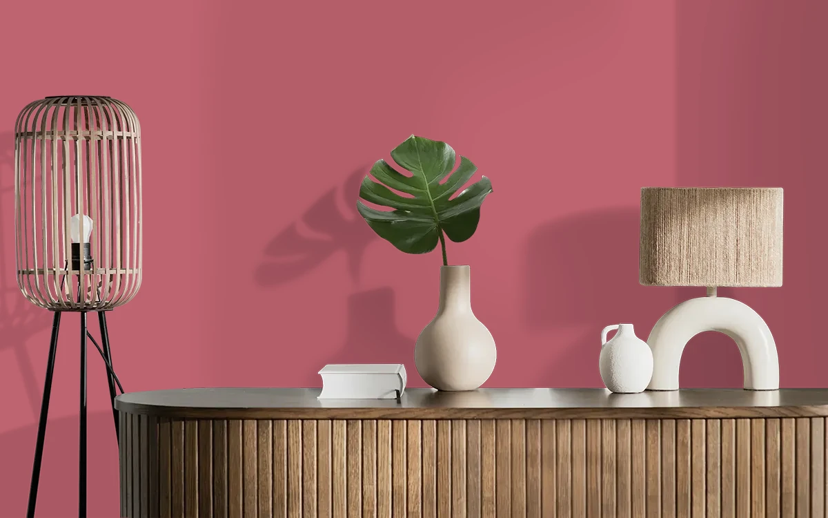 Nippon Paint's CROWNED RUBY color on different wall surfaces.