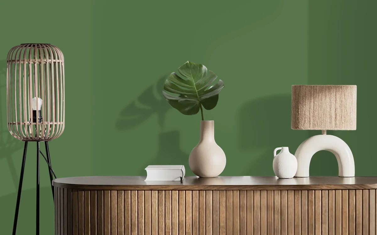 Nippon Paint's DARK GREEN color on different wall surfaces.