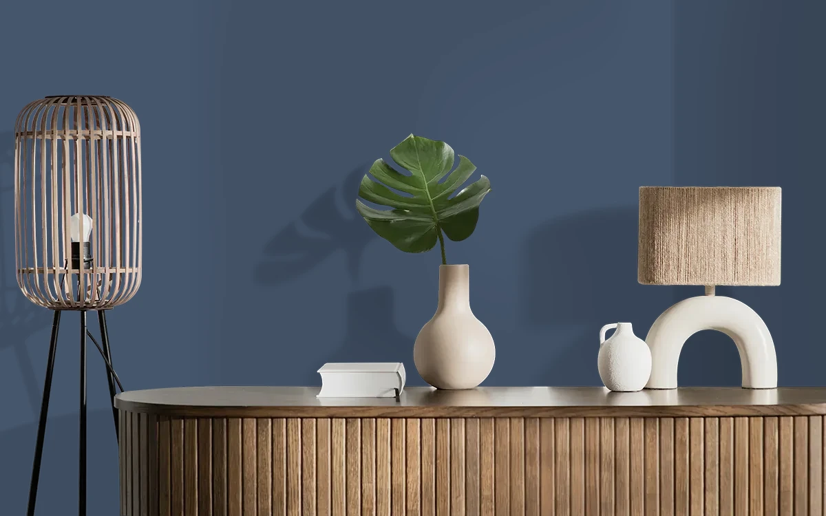 Nippon Paint's DEEP BLUE SEA color on different wall surfaces.