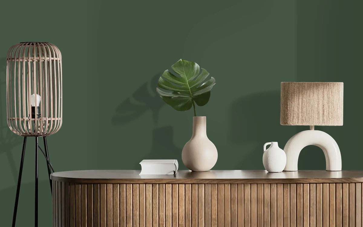 Nippon Paint's DEEP ROOTS color on different wall surfaces.