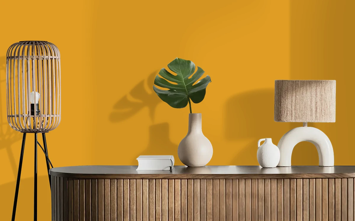 Nippon Paint's DEEP SAFRON color on different wall surfaces.