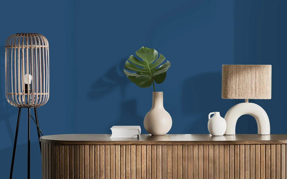 Nippon Paint's DENIM DREAM color on different wall surfaces.