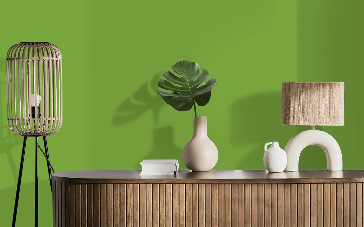 Nippon Paint's DOMINO GREEN color on different wall surfaces.